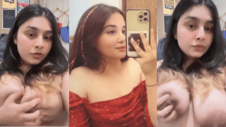 Big Boobies Beauty Plays With Her Massive Tits on Camera